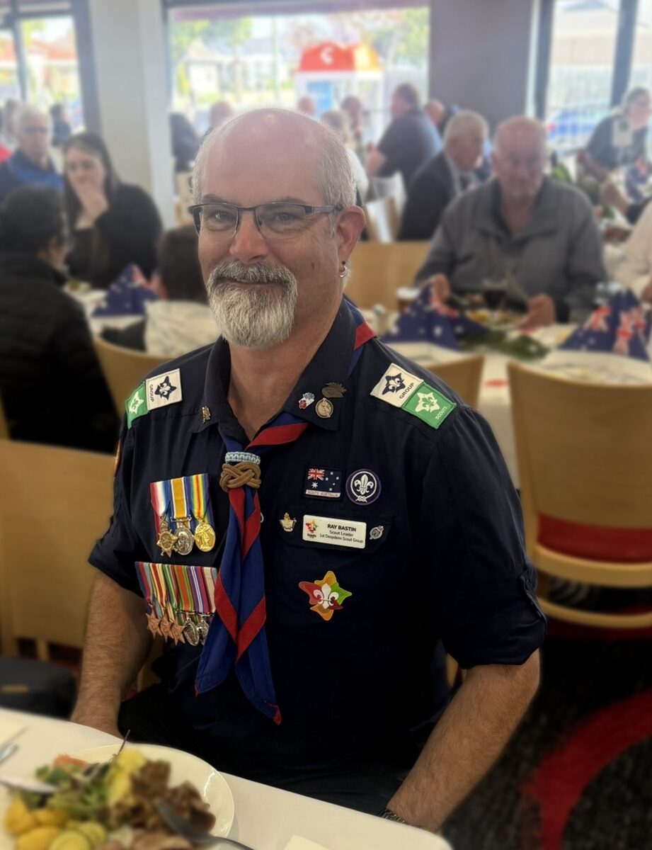 Ray Bastin, Group Leader of 1st Deepdene Scouts, in Scout uniform with service medals